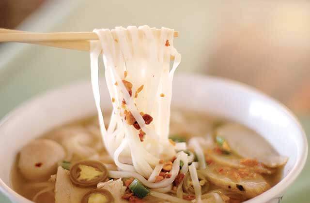chopsticks holding pho noodles bowl best shabu shabu world noodle pho orlando