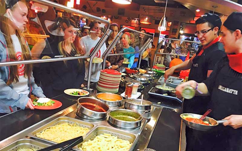 cooks serving soups at buffet oreganatta italian buffet orlando