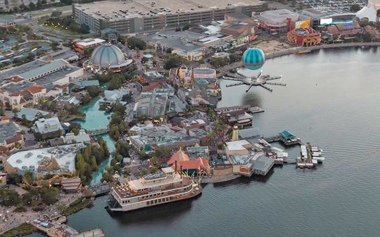 early morning view from above of disney springs with balloon and boats at maxflight helicopter services