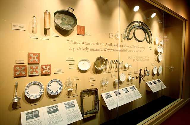 glass wall display of artifacts from ship titanic artifact exhibit orlando