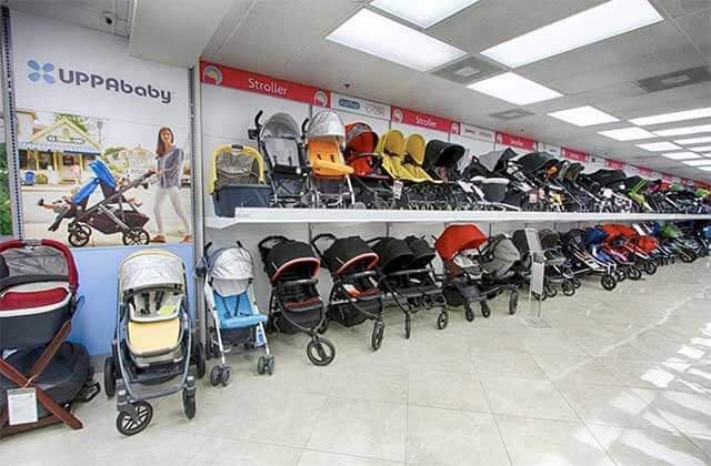 huge selection of strollers on shelves at macrobaby store orlando