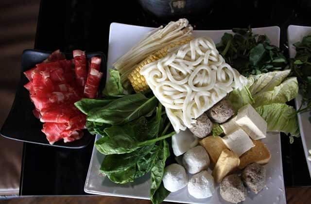 meat noodles vegetables prep dishes nine spices hot pot orlando