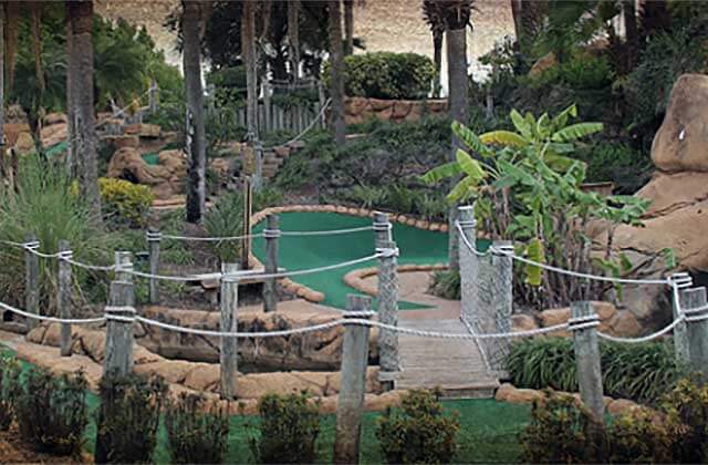mini golf course with winding greens and lush tropical foliage lost caverns adventure golf orlando