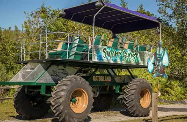 monster truck tour bus with swamp ghost sign at gatorland orlando