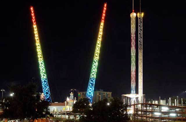 multi colored lighting at night at magical midway slingshot orlando