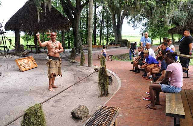 native american speaks to tour group at boggy creek airboat adventures kissimmee