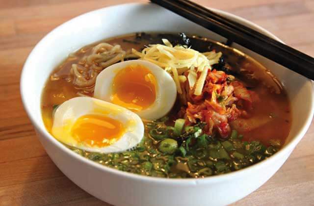 pho bowl with soft boiled egg and colorful garnish at best shabu shabu world noodle pho orlando
