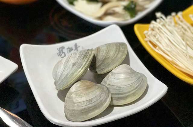 plate of clams enoke mushrooms for hot pot prep dishes nine spices hot pot orlando