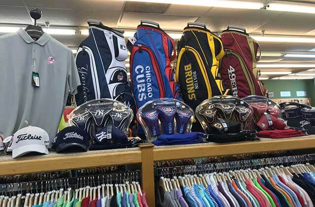 rack with golf bags hats and apparel at americas golf outlet superstore orlando