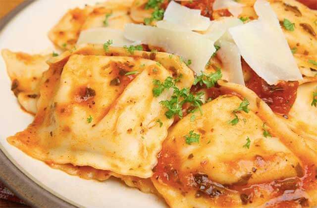 ravioli entree with parsley and cheese topping oreganatta italian buffet orlando