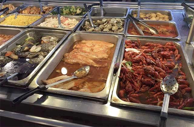 selection of fish fillets crayfish oysters and other seafood at mei asian china buffet orlando