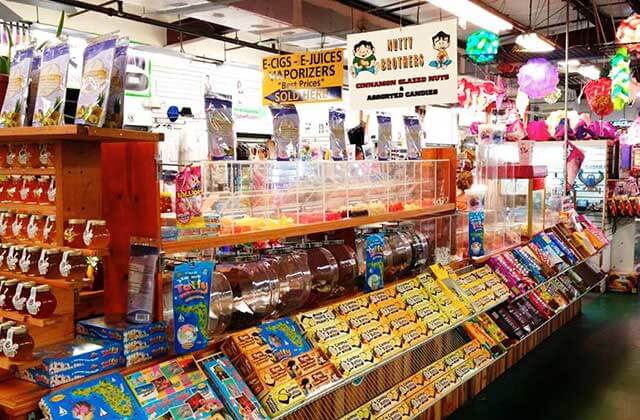 selection of local honey and fruit products at maingate flea market kissimmee