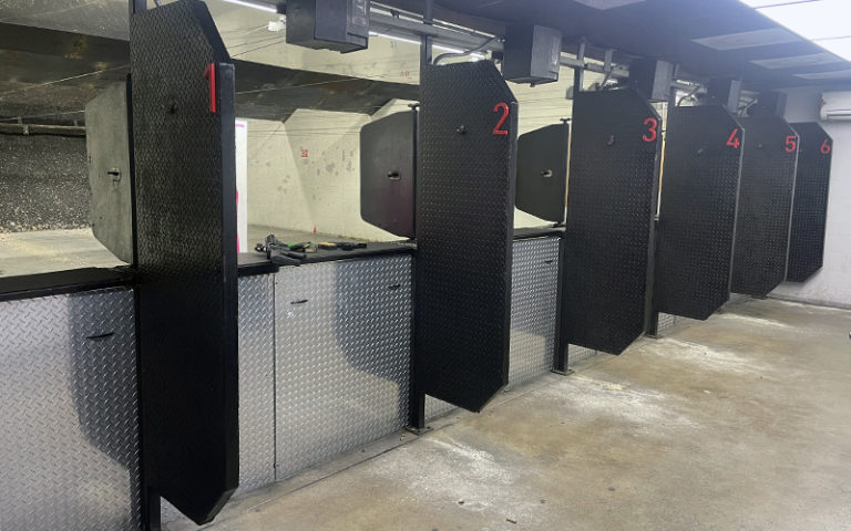 separate stalls in shooting range numbered up to six at shooting gallery range orlando