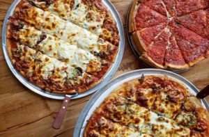 three varieties of deep dish pizza at giordanos orlando kissimmee