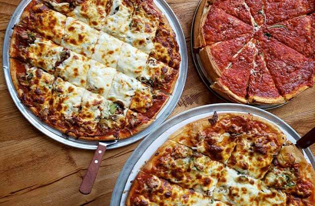 three varieties of deep dish pizza at giordanos orlando kissimmee