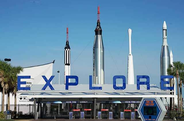 ticket gates with word explore and rockets kennedy space center visitor complex