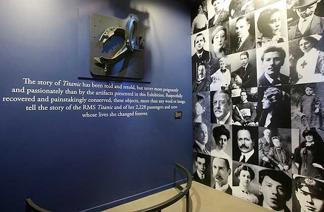 wall display of passengers photos titanic artifact exhibit orlando