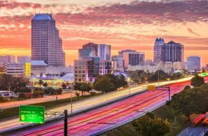 sunset skyline cityscape with highway in orlando destination feature