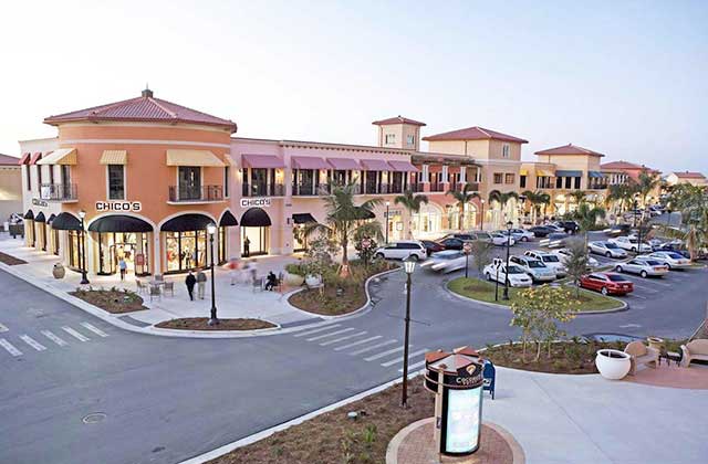 aerial view of exterior storefronts and parking at coconut point estero florida