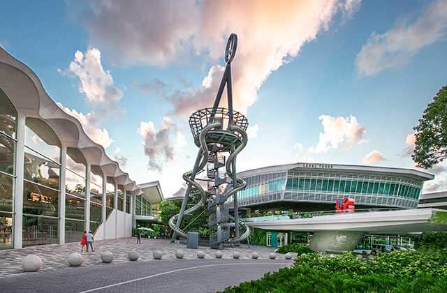 aerial view of statues and three story slide at aventura mall florida