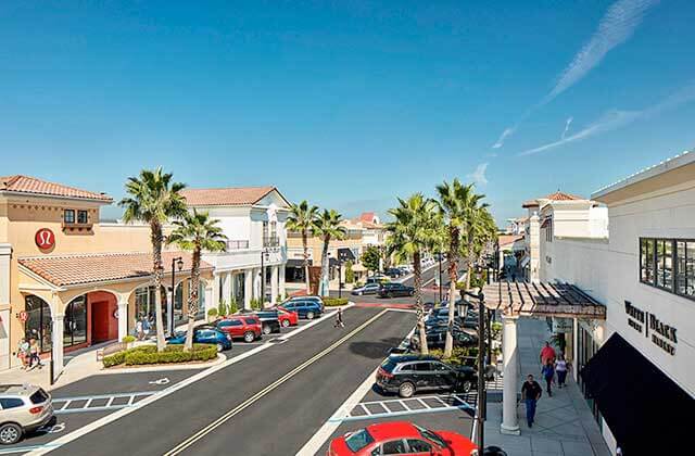 aerial view of storefronts with parking on the street at st johns town center jacksonville