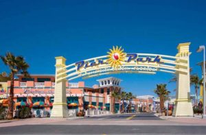 archway gate with sign for complex at pier park panama city beach