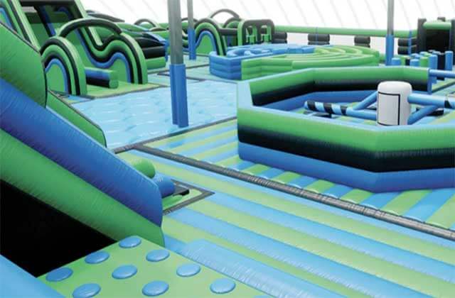 blue and green trampoline obstacle course at off the wall gamezone coconut creek florida