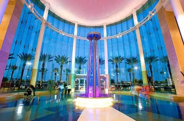 colorful lighting inside the atrium entrance at an upscale at mall at millenia orlando
