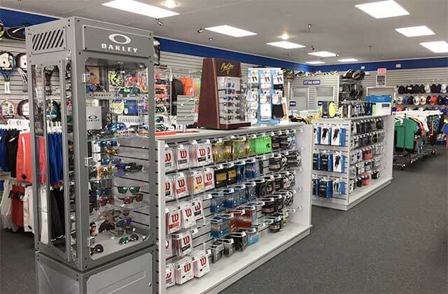 counter displays and racks of accessories and sunglasses at tennis plaza florida stores