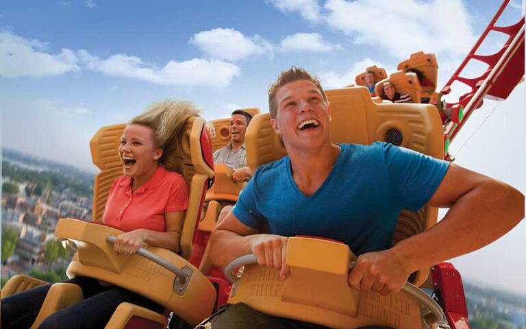 couple hanging on coaster at universal studios florida