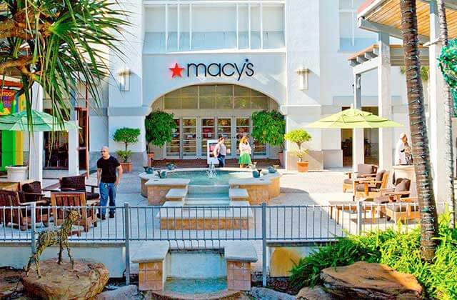 exterior with macys storefront waterfalls and patio area at the falls miami florida