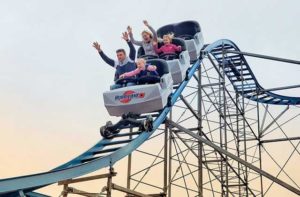 family of four on hurricane roller coaster ride at fun spot america orlando