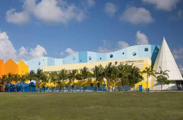 front exterior of building with palm trees at miami childrens museum florida