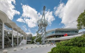 front exterior of mall with metal structure slide at aventura mall miami