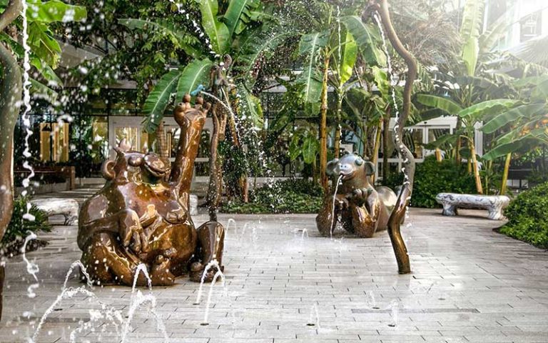 garden splash pad with bronze gorillas at aventura mall miami