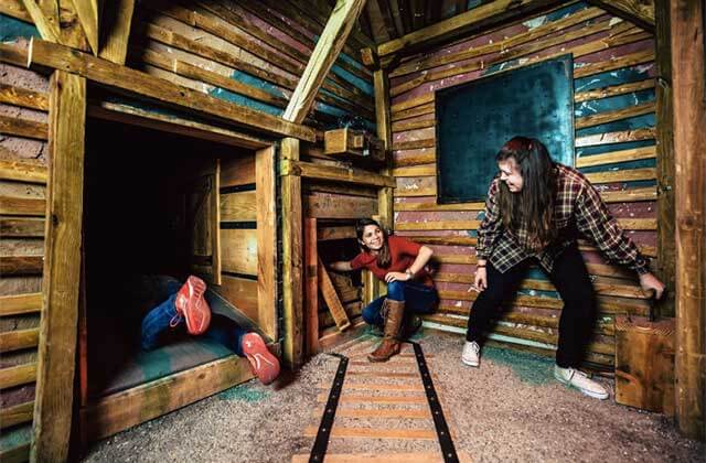 group of teens searching for clues at the escape game orlando