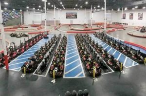indoor track with rows of go karts at k1 speed indoor kart racing orlando