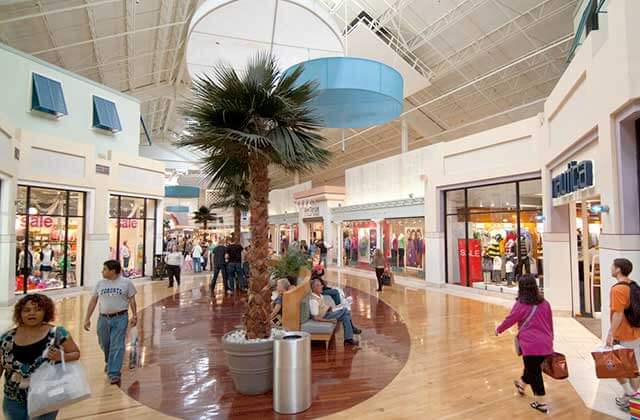 interior corridor shopping with stores palm tree and atrium at sawgrass mills mall sunrise florida