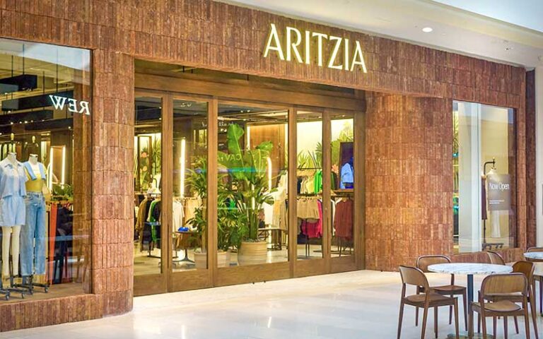 mall store front aritzia with tables and chairs at aventura mall miami