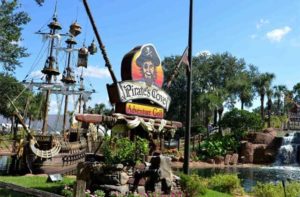 mini golf course with ship and pirates cove sign at pirates cove adventure golf orlando