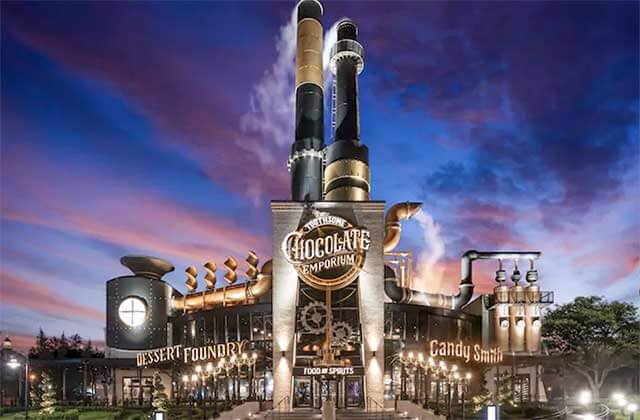 night exterior of chocolate emporium building with factory theme at universal citywalk orlando