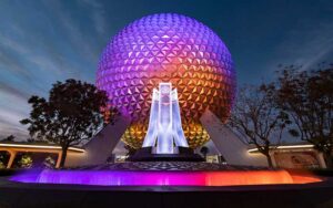 night view of epcot spaceship earth globe with monument and colorful lighting at epcot walt disney world resort orlando