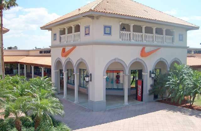 outdoor mall with storefronts with nike sign at florida keys outlet marketplace