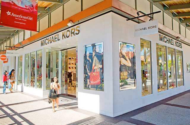 outdoor mall with michael kors storefront at the falls miami florida