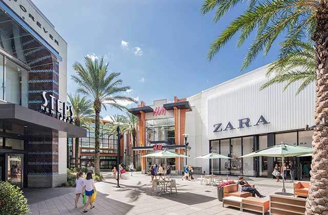 outdoor storefronts with patio seating area at the florida mall orlando