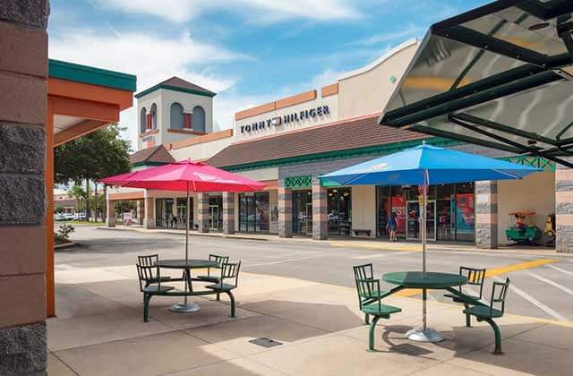 patio area outside shopping center at st augustine premium outlets florida