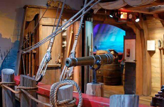 a replica cannon on a ship exhibit at st augustine pirate treasure museum florida