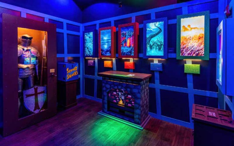 row of colorful clues with armor suit scooby theme at escapology orlando