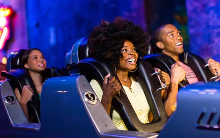 smiling riders about to launch on rock n roller coaster starring aerosmith at disneys hollywood studios walt disney world resort orlando