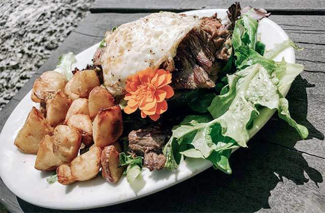 steak and egg entree with potatoes platter at schnebly redlands winery brewery restaurant homestead